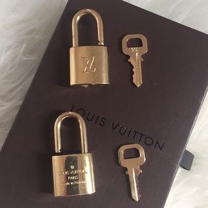 Auth L Vuitton padlock w key, numbers available
